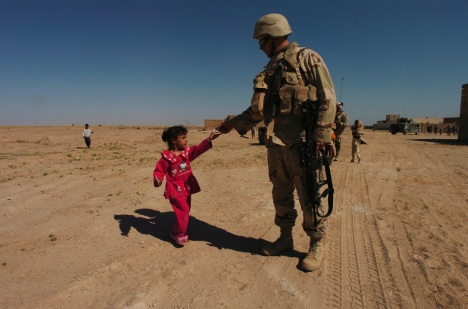 Soldier with Iraqi Child